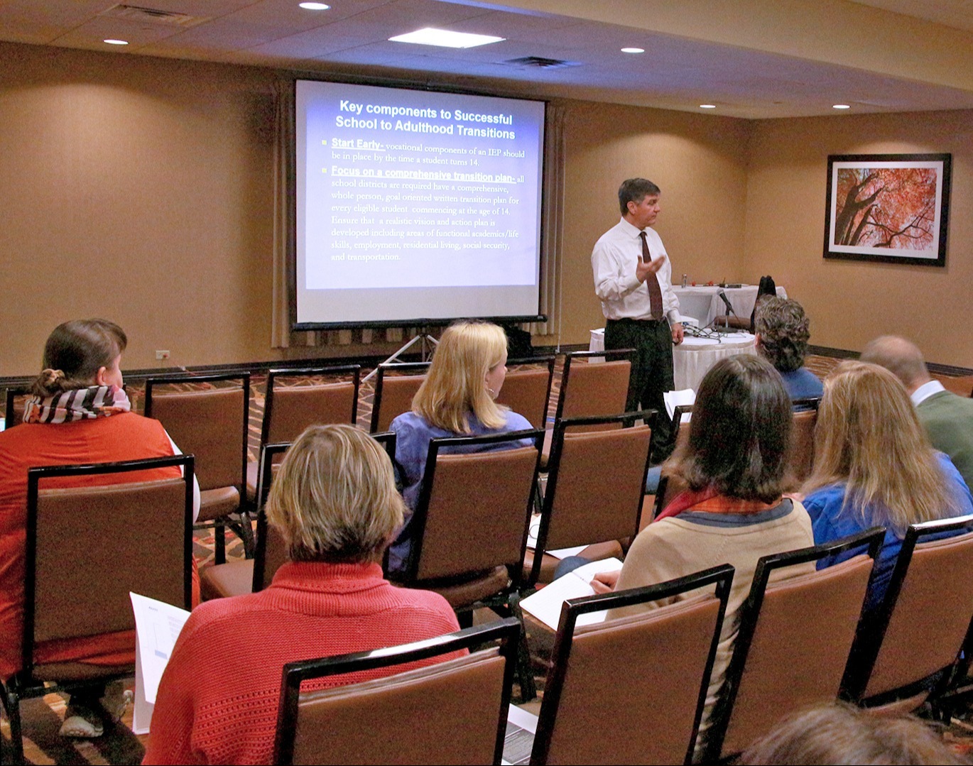 A speaker addresses a group, sharing insights and information during a Breakout Session